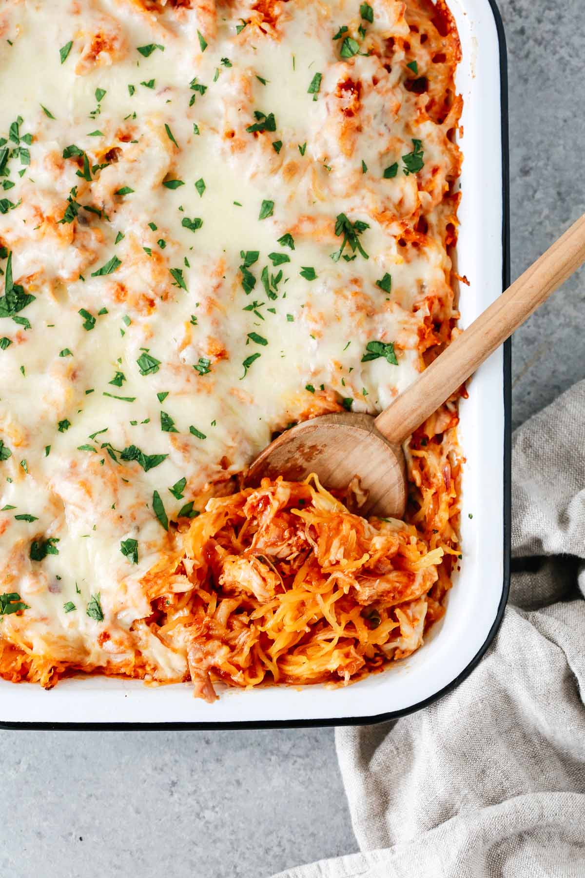 Overhead photo of a baking dish of spaghetti squash casserole 