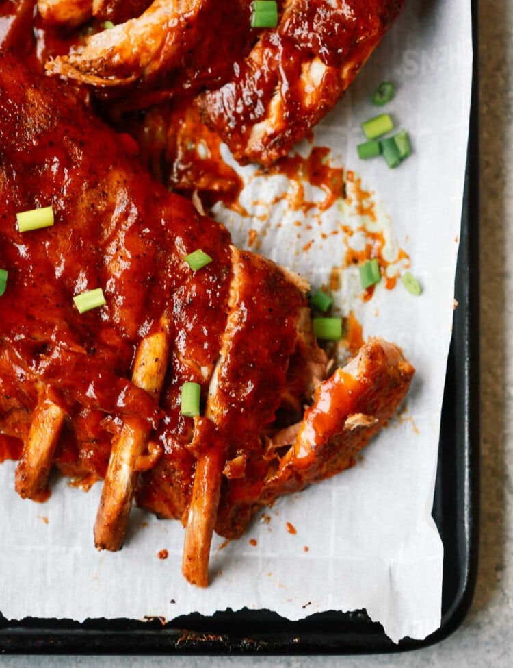 overhead view of ribs on a baking sheet