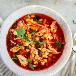 overhead view of a white bowl of Southwest Chicken Soup