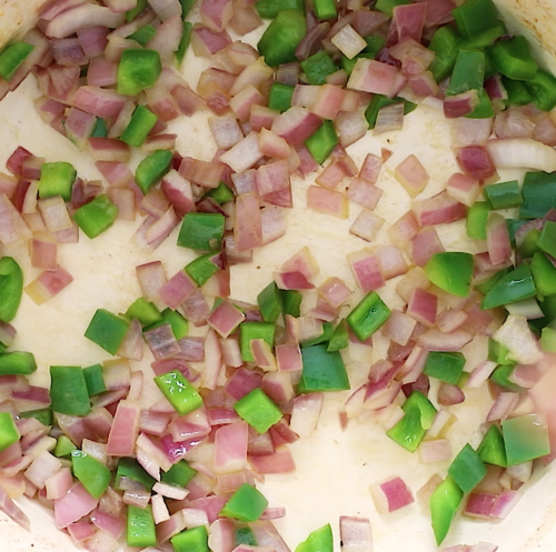 close up of sautéed onions and bell pepper