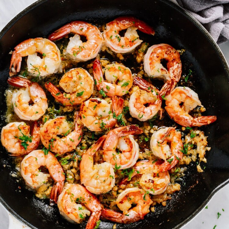 overhead view of a skillet containing garlic butter shrimp