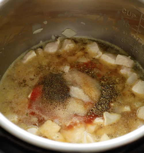 closeup view of a chicken stew inside of an instant pot