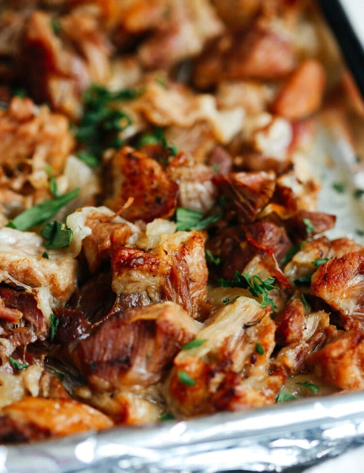 close up of carnitas on a baking sheet