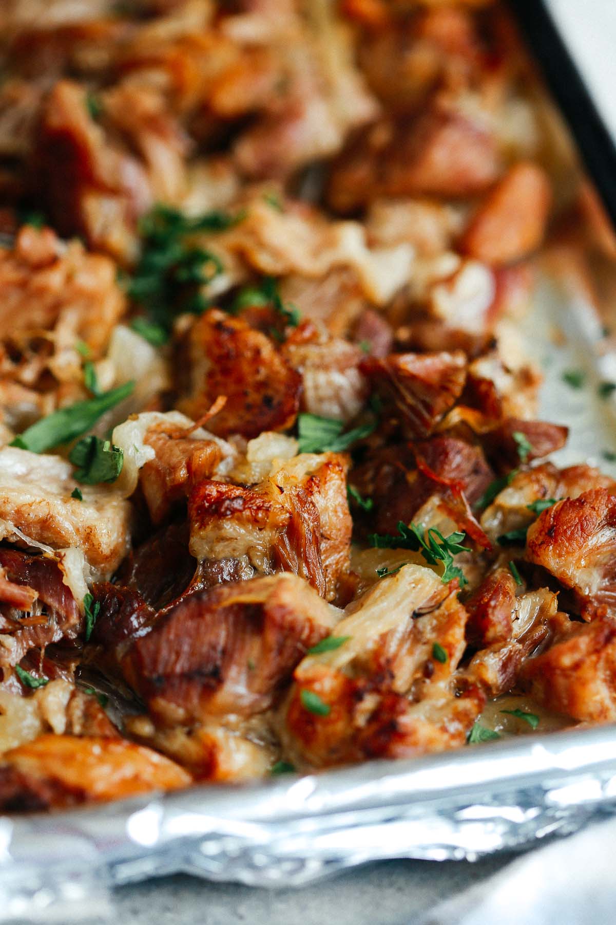 Close up of Instant Pot Carnitas on a sheet pan.