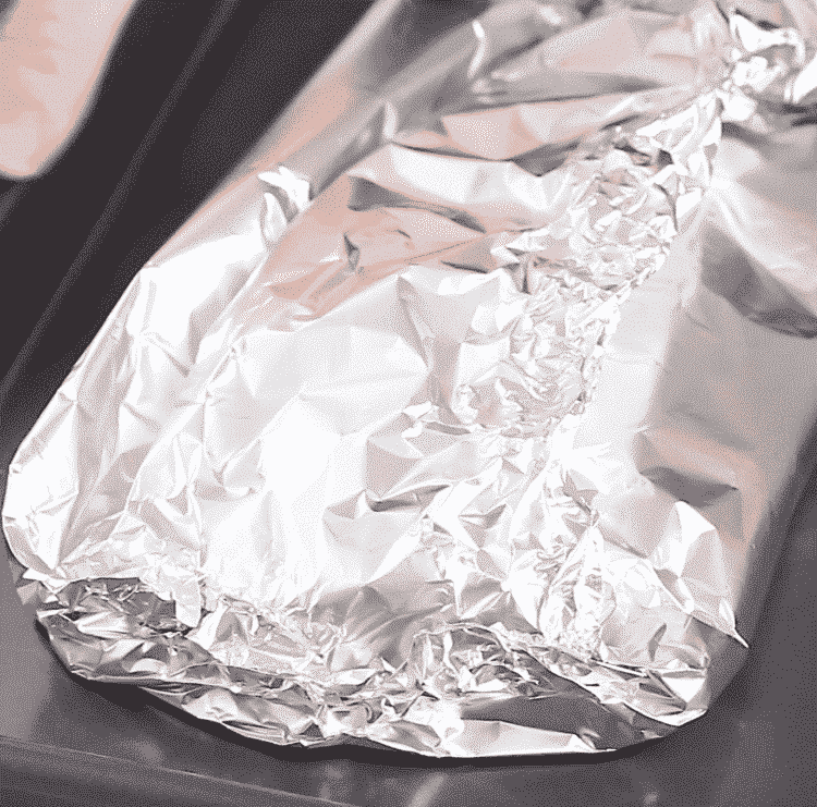close up view of salmon folded in foil