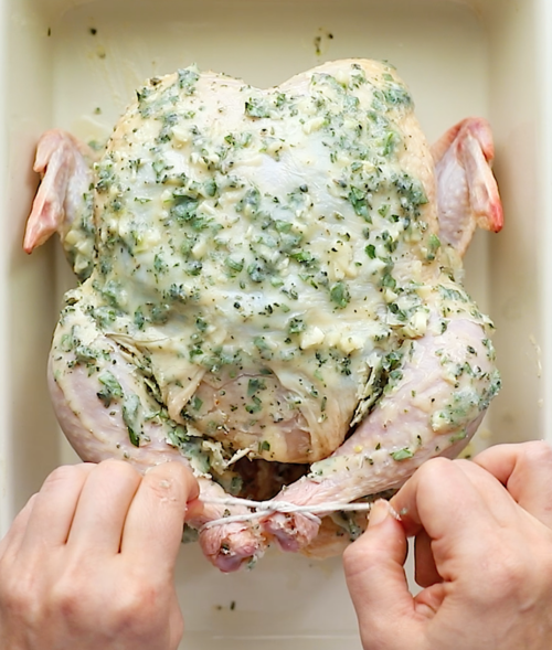 overhead view of a seasoned whole chicken