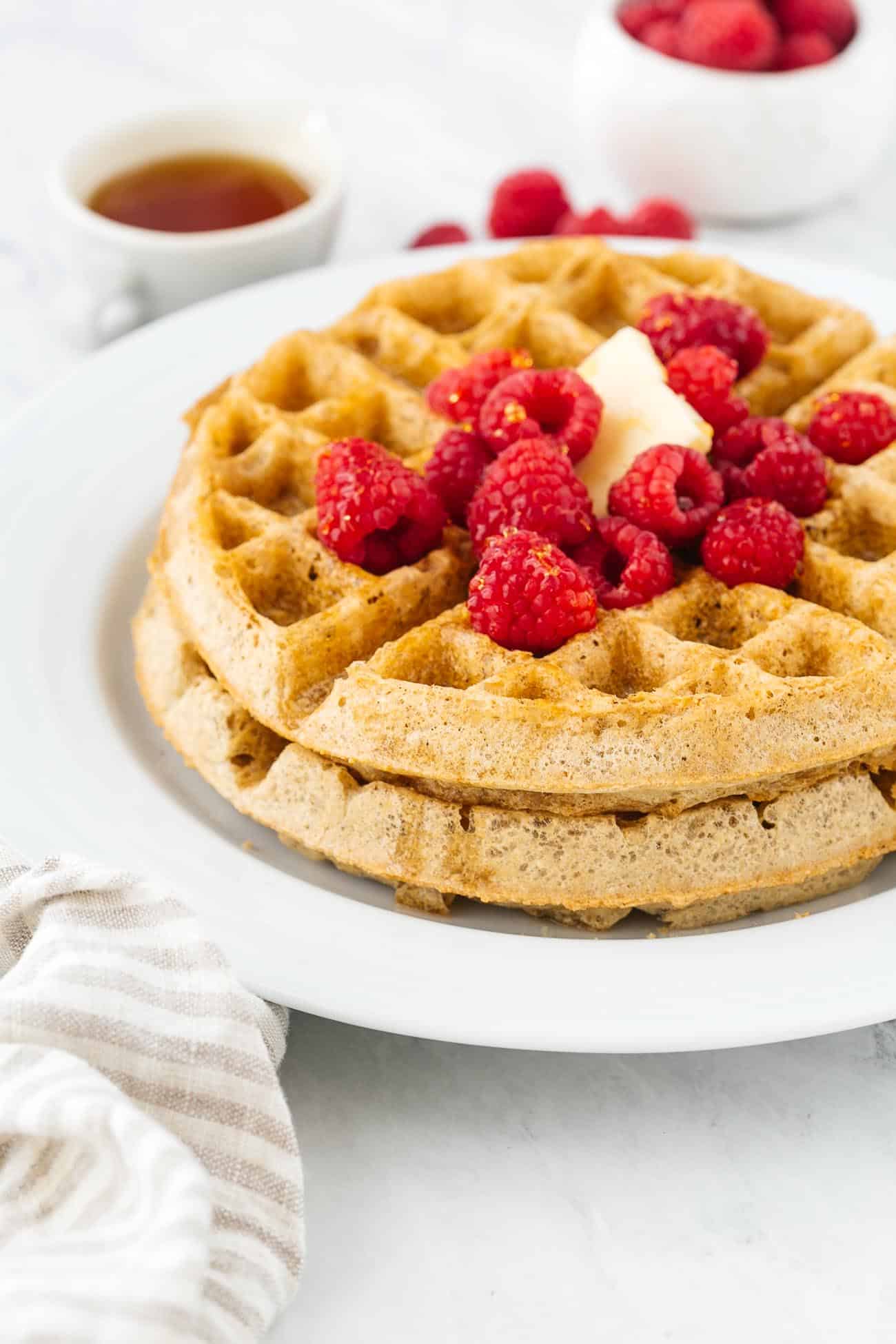 Close up of gluten free waffles with fresh berries.