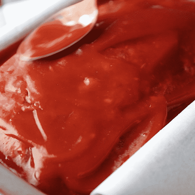 closeup of ketchup on top of meatloaf
