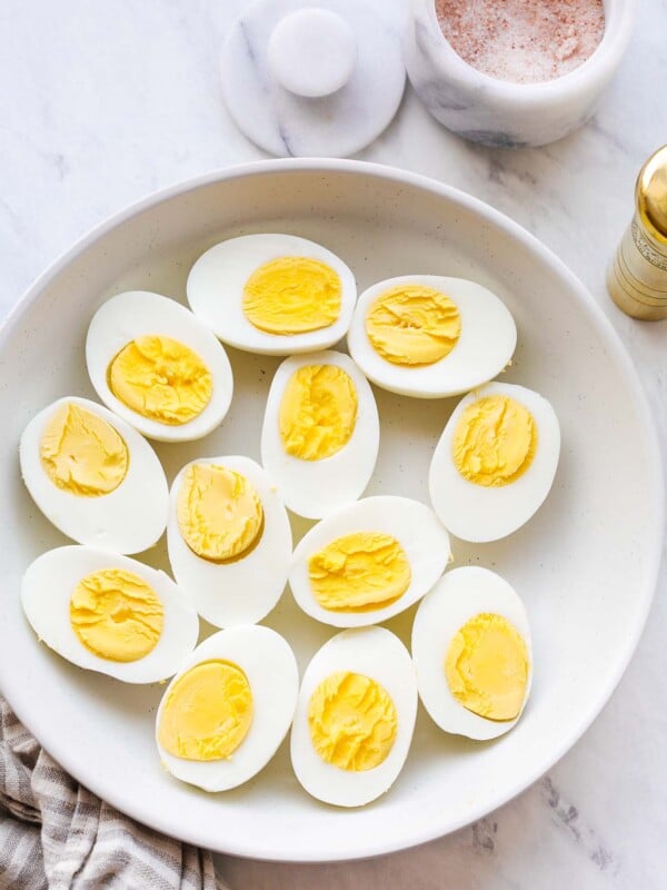 a plate with hard boiled eggs cut in half