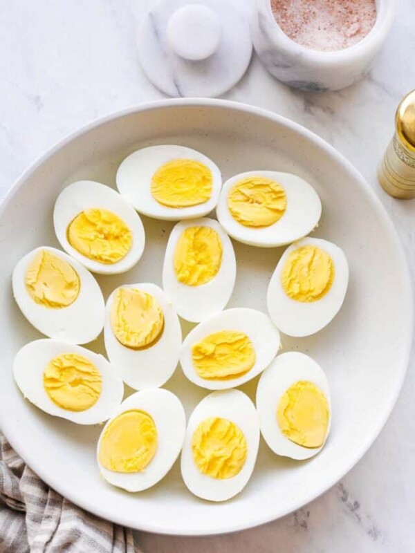 a plate with hard boiled eggs cut in half