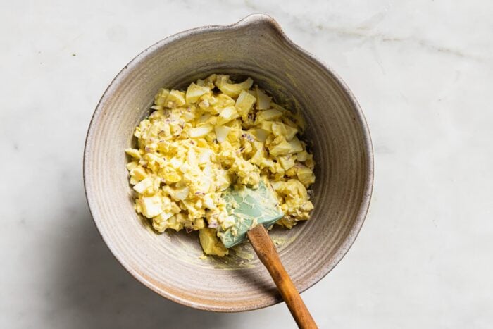 egg salad ingredients in a bowl