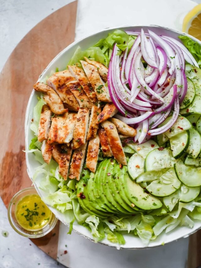 overhead view of grilled chicken avocado salad