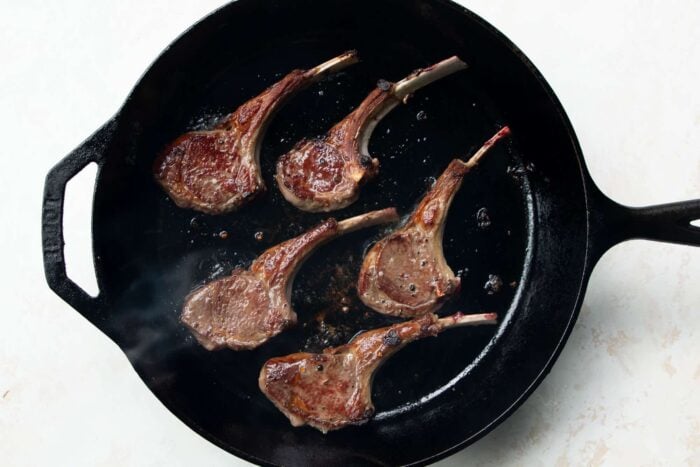 lamb chops in a skillet