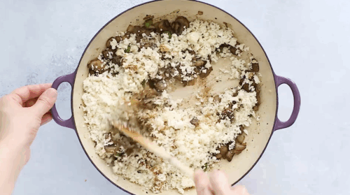 cauliflower rice with mushroom in a skillet