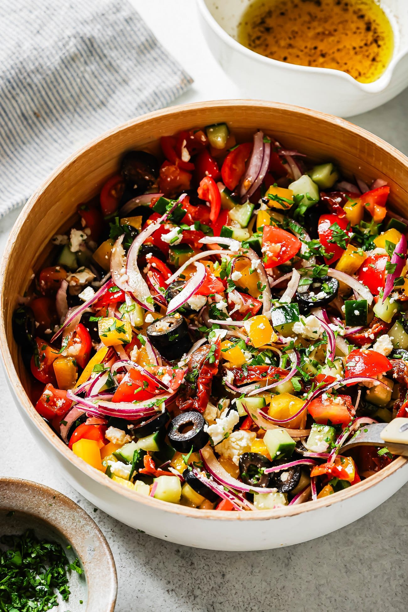 overhead view of a Mediterranean Salad in a white bowl