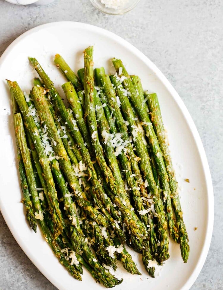 overhead view of air fryer asparagus