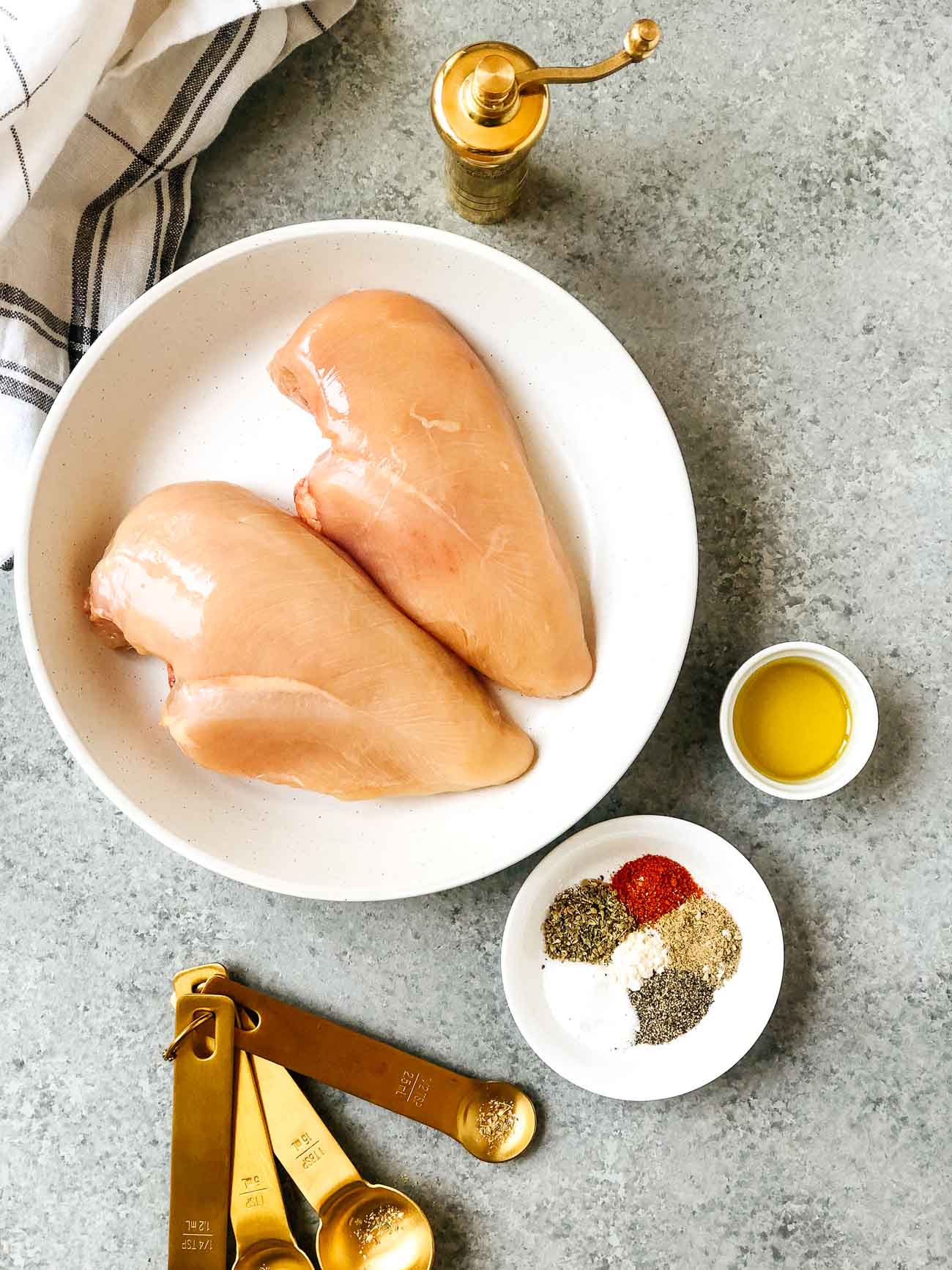 overhead view of ingredients to make air fryer chicken breast
