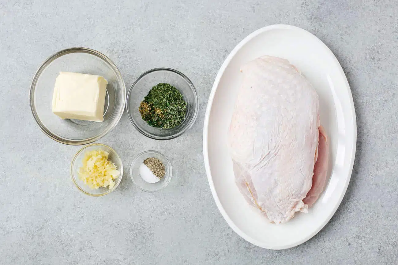 Ingredients needed to make garlic butter turkey breast.