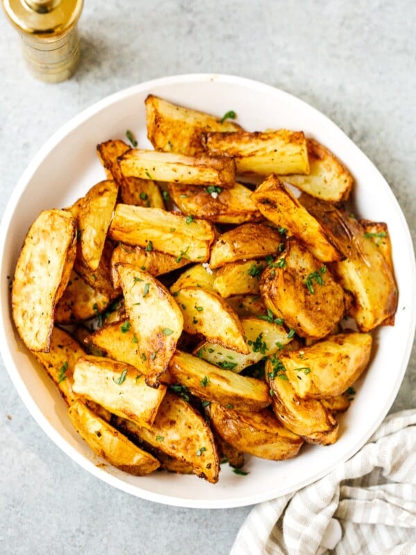 overhead view of air fryer potato wedges
