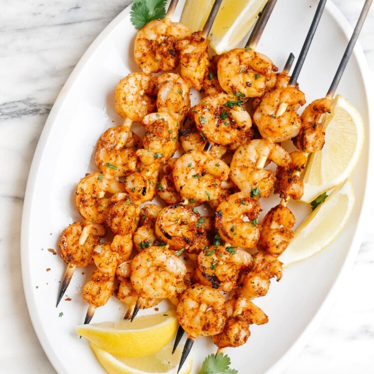 overhead view of cajun shrimp skewers