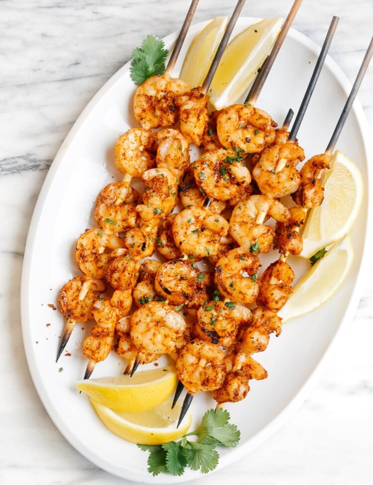 overhead view of cajun shrimp skewers