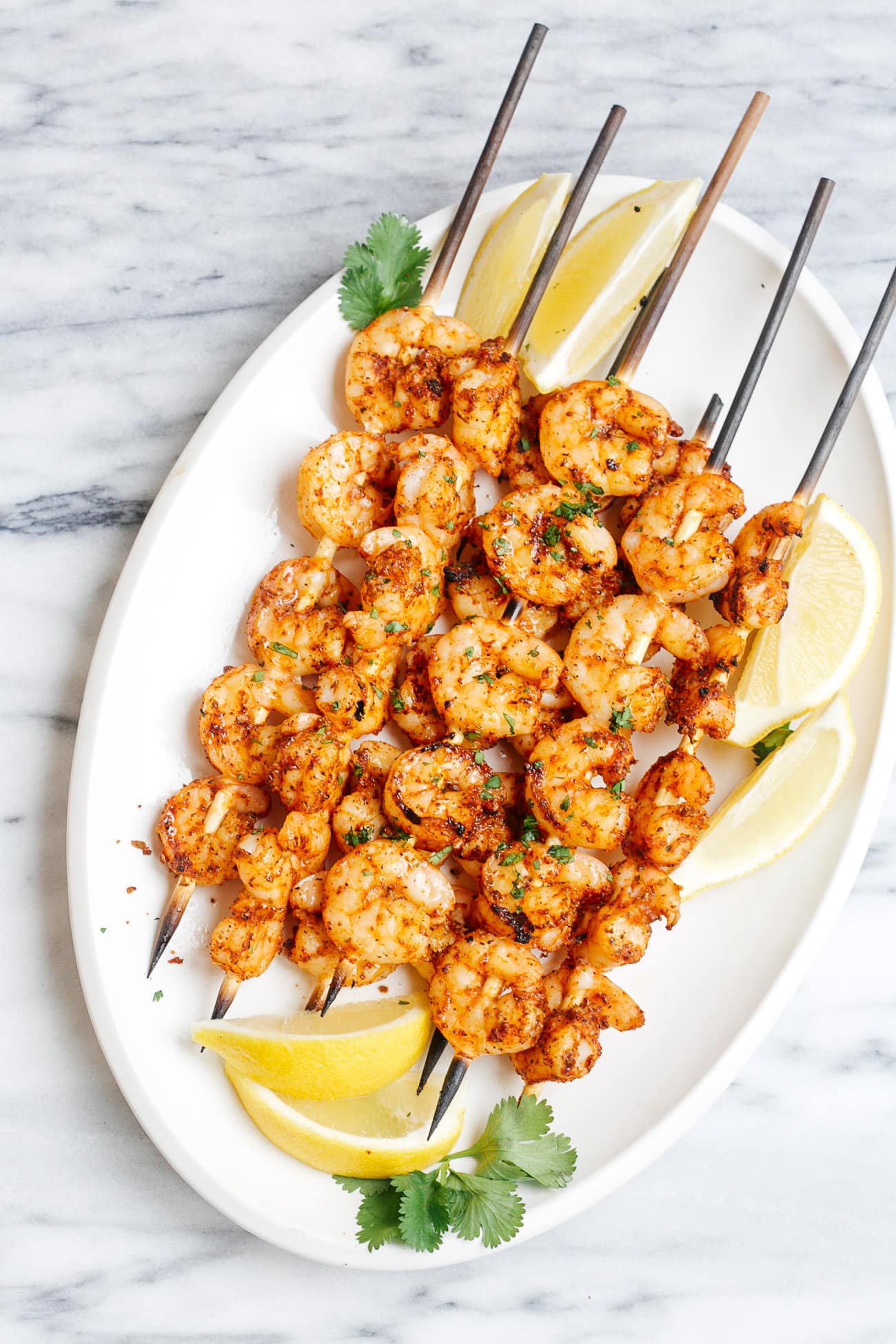 overhead view of cajun shrimp skewers