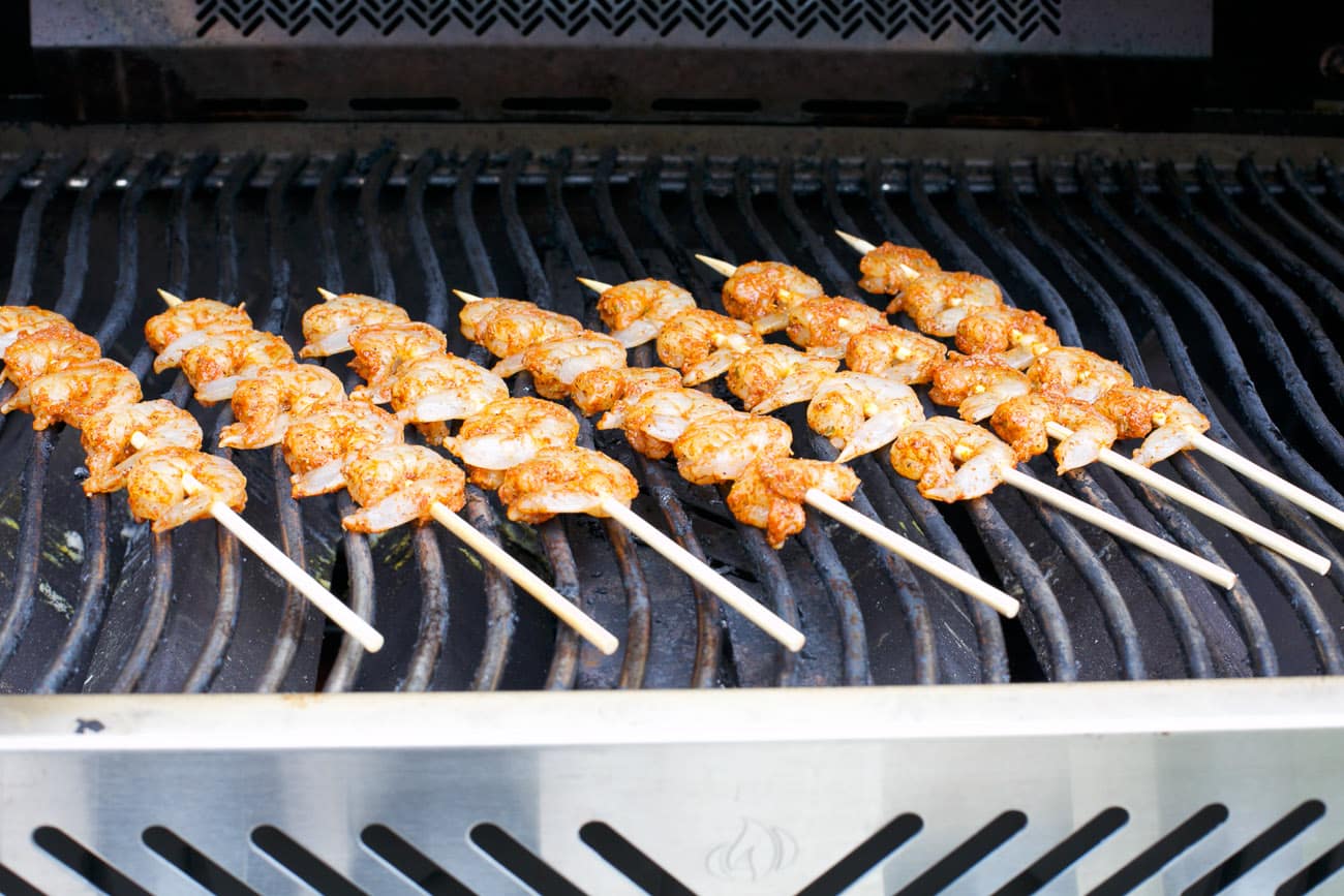 shrimp kabobs in a grill.
