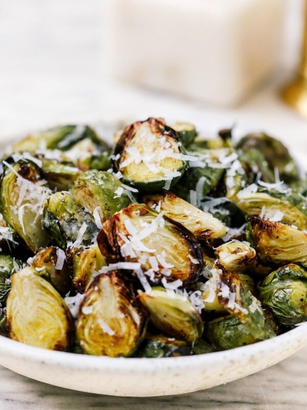 closeup of brussels sprouts in a white bowl