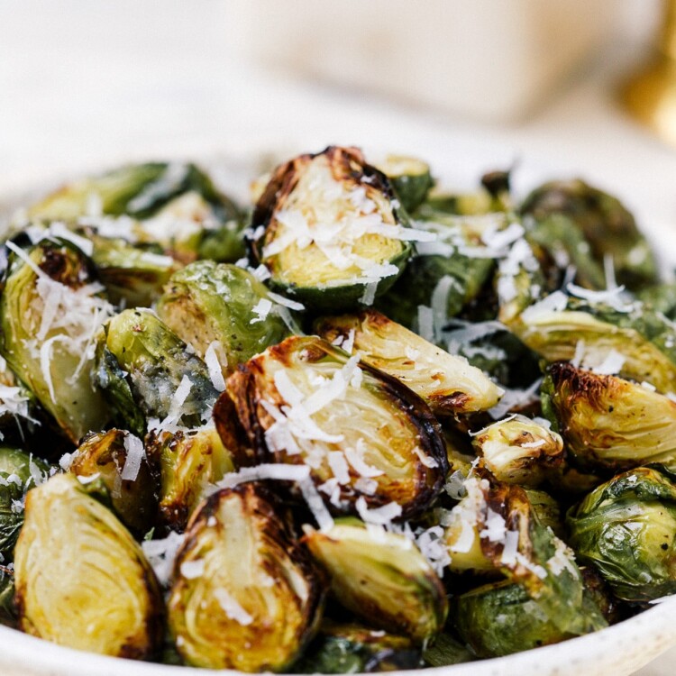 closeup of brussels sprouts in a white bowl