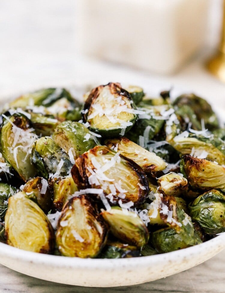 closeup of brussels sprouts in a white bowl