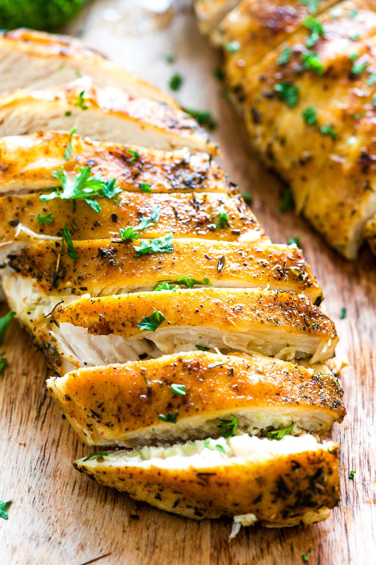 Cooked chicken breast cut into slices.