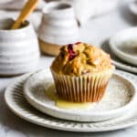 closeup of cranberry muffins in a white small plate