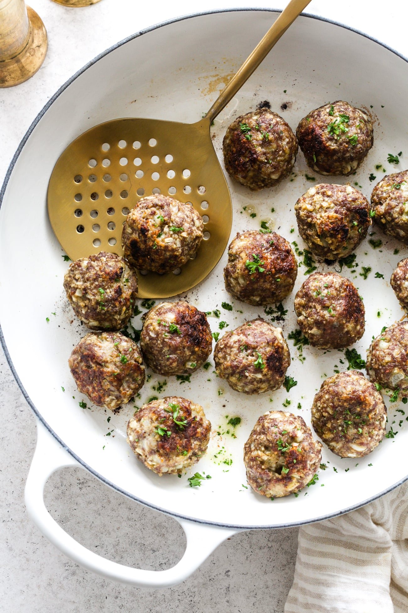 Closeup view of Turkey Meatball in a white skillet