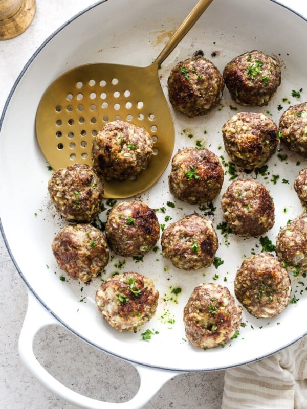 Overhead view of Turkey meatball in a white skillet