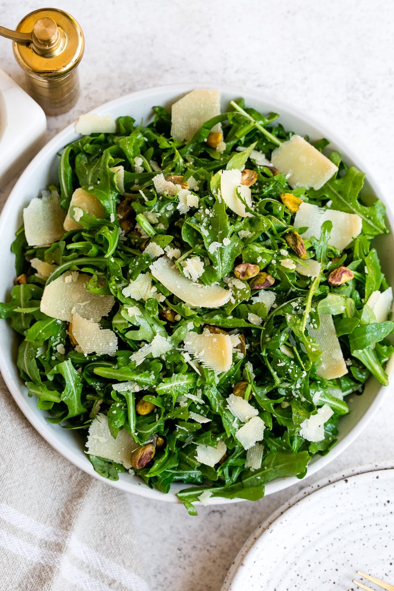 Overhead view of arugula salad.