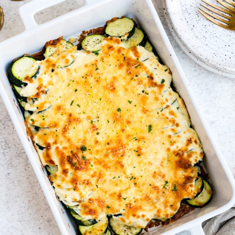 Zucchini casserole in a large, white baking dish.