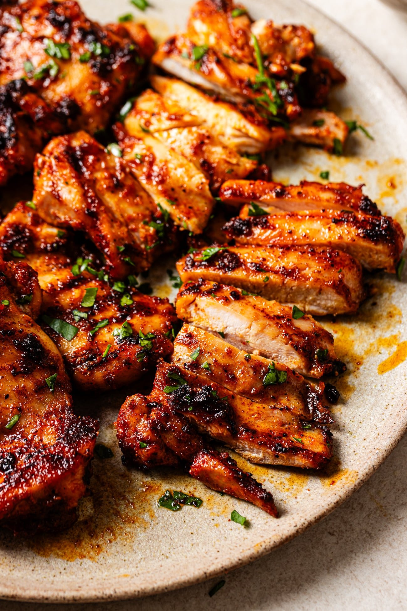 closeup view of grilled chicken thighs