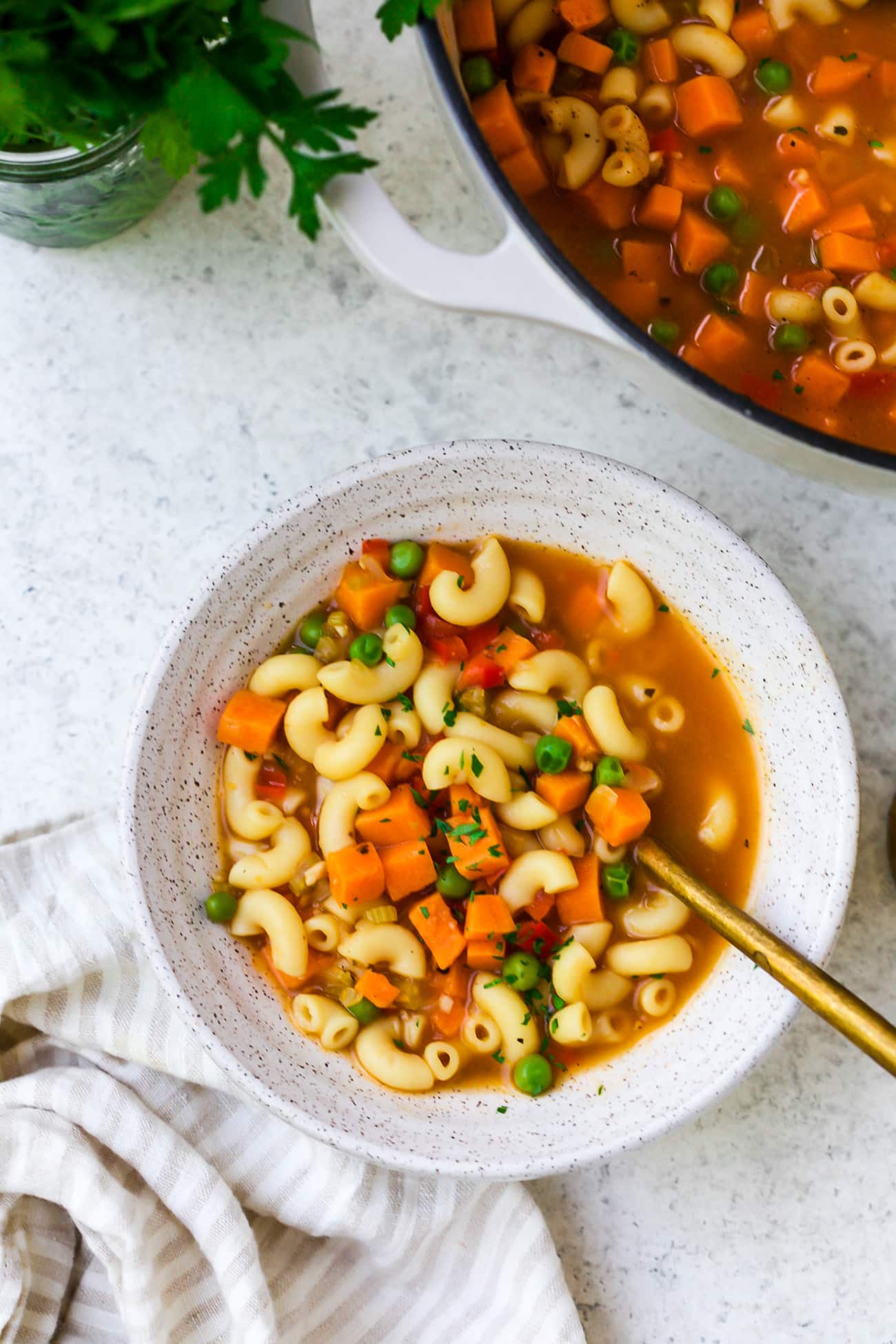 A bowl of pasta soup.