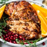 closeup view of an air fryer turkey breast in a white plate