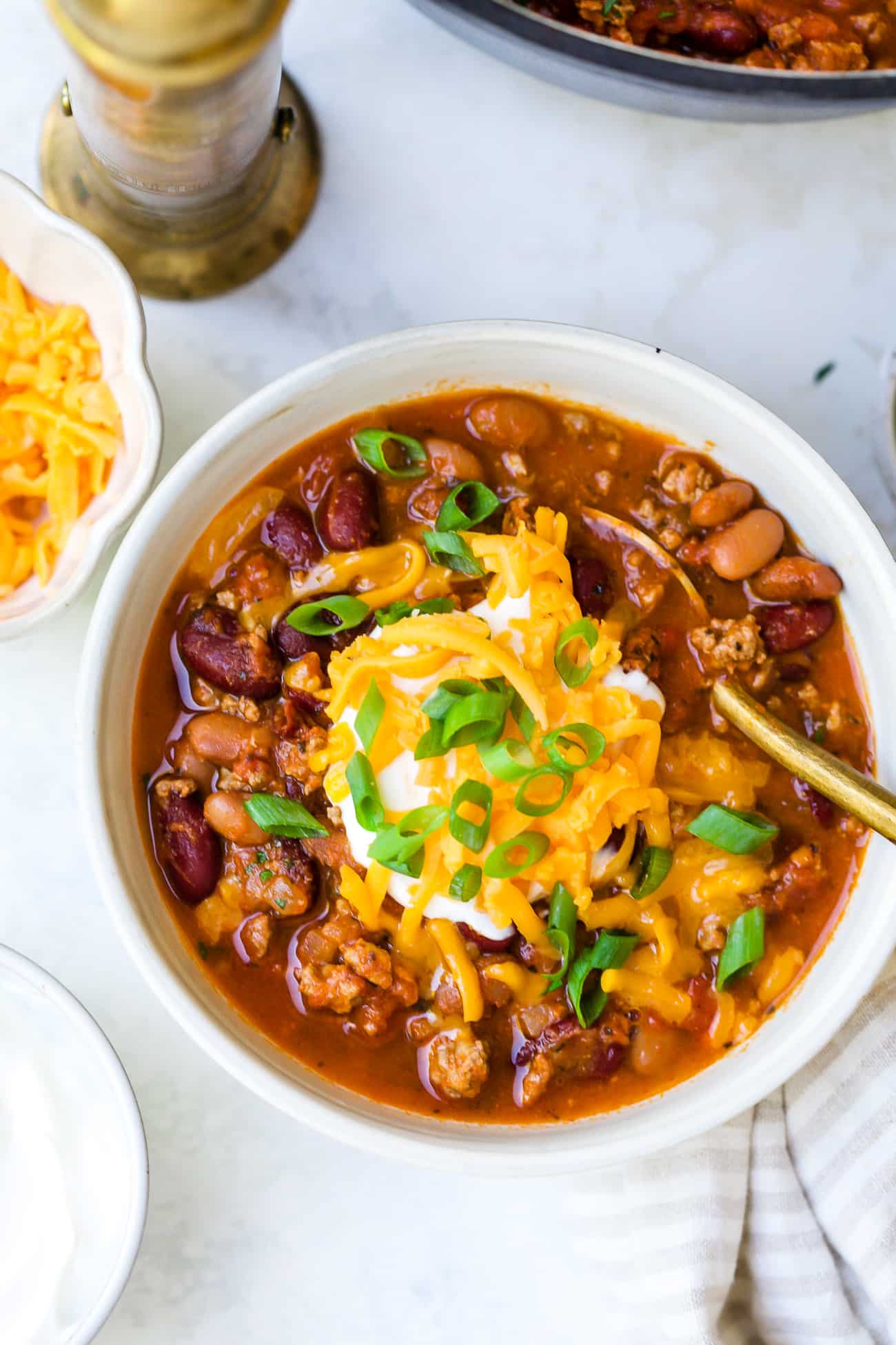 overhead view of a white bowl with classic chili recipe