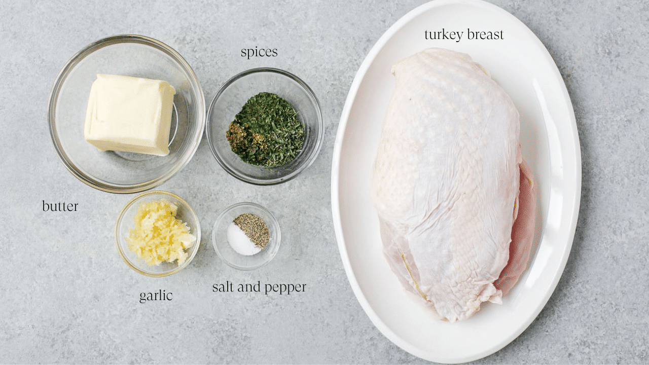 Ingredients in small glass bowls to make a garlic butter turkey breast.