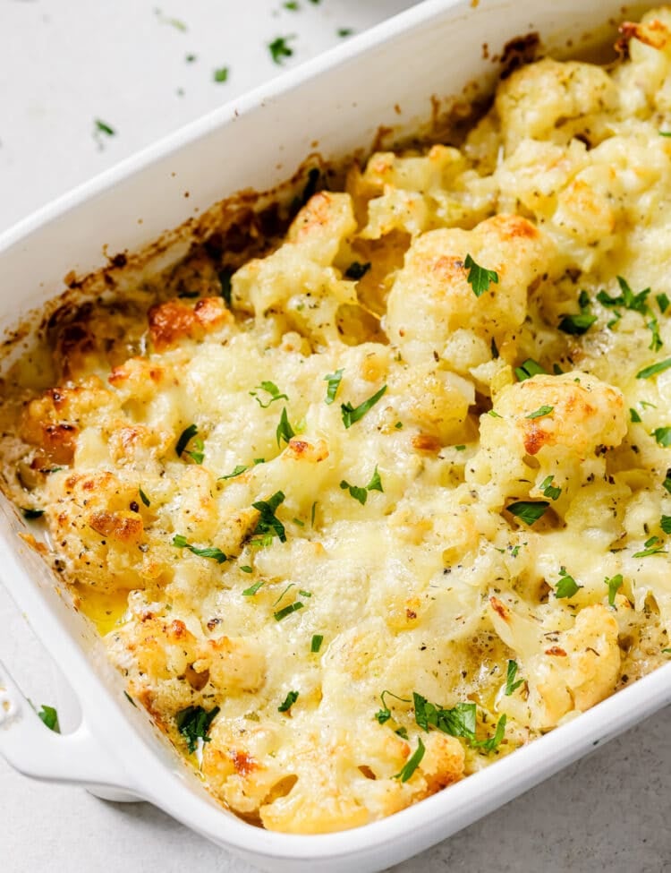 Close up of cauliflower au gratin in a baking dish.