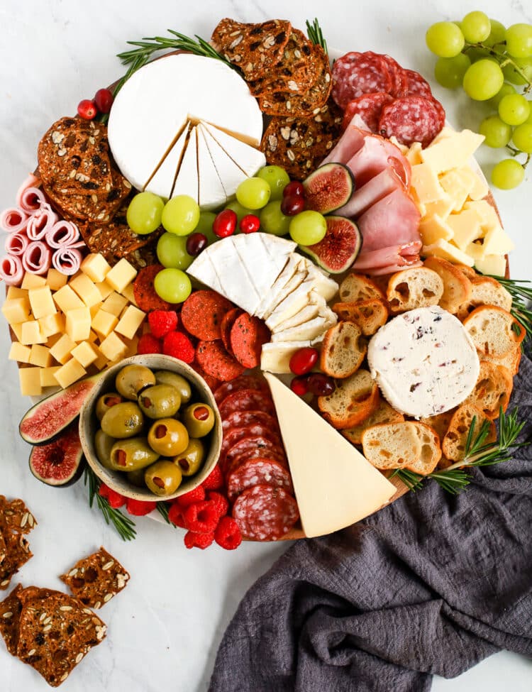 charcuterie board with meats and cheeses