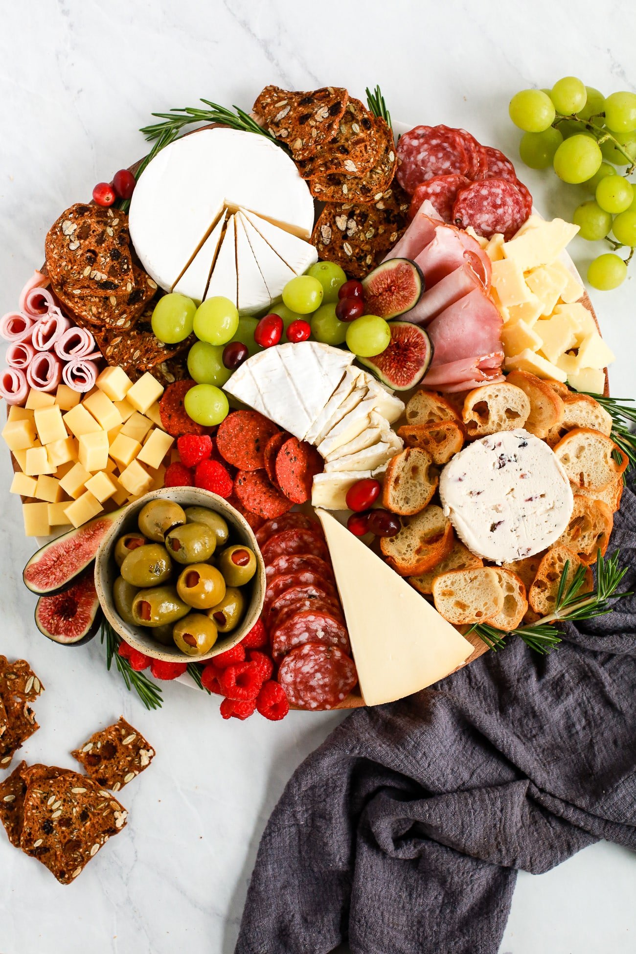 charcuterie board with meats and cheeses