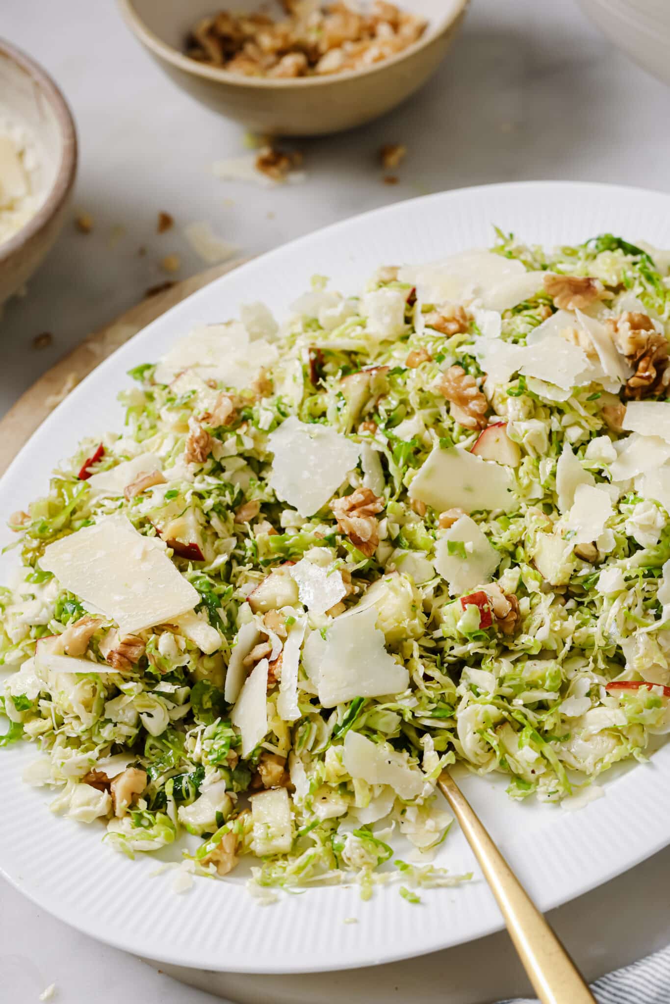 Shaved Brussels Sprouts Salad on a serving dish. 