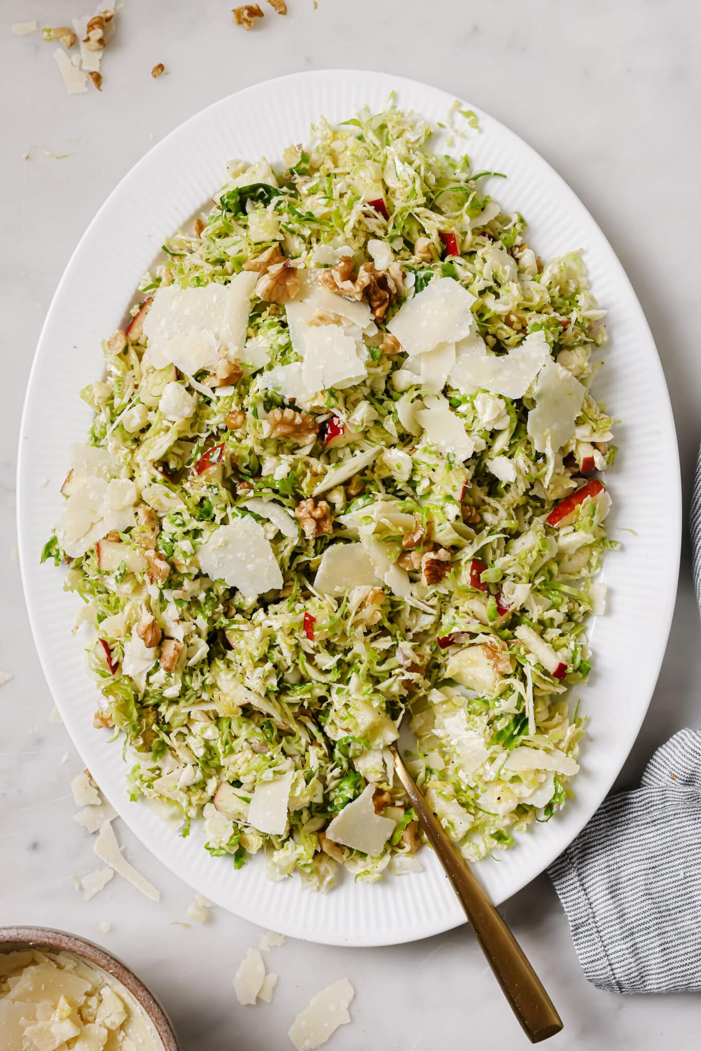 Shaved Brussels Sprouts Salad on a serving dish. 