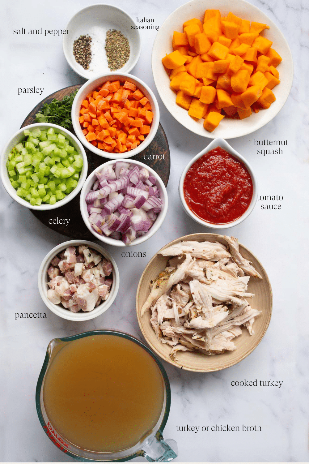 ingredients to make turkey vegetable soup on a countertop