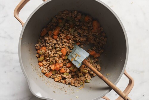 ground turkey and veggies in a grey pot