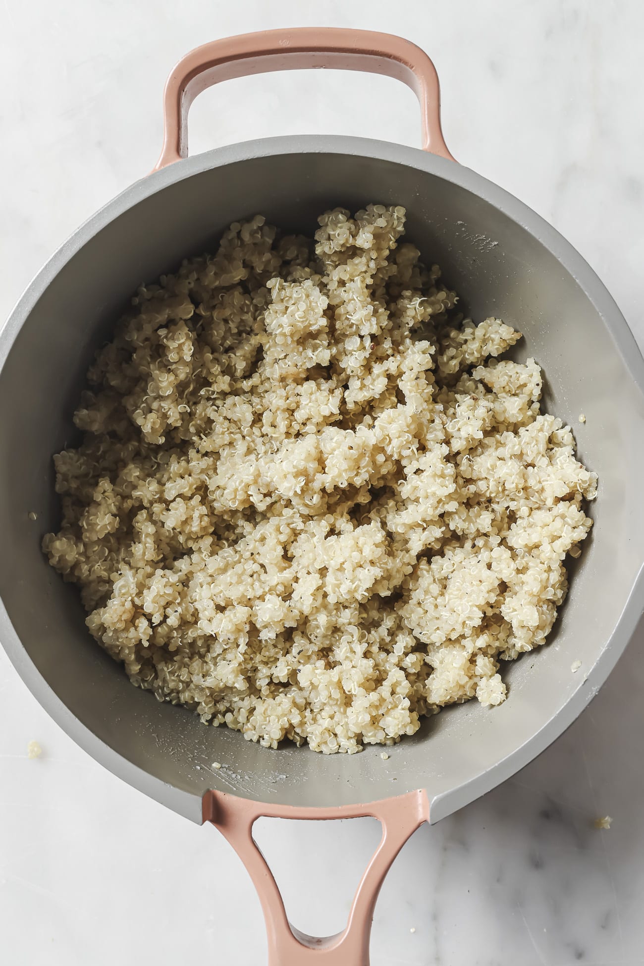Close-up of cooked quinoa in a pot. 