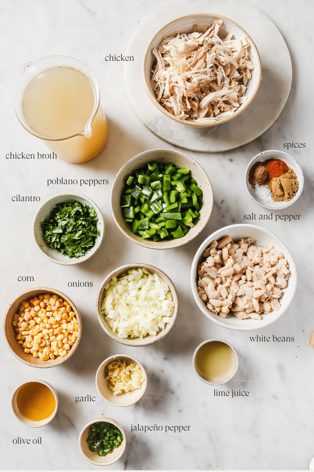 Pre-measured ingredients for White Chicken Chili in small bowls. 
